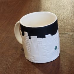 Starbucks Relief Los Angeles City Skyline 2012 Limited Collector Series 
Mug Cup. Pre-owned, good shape, no chips or cracks. Microwave and 
dishwasher