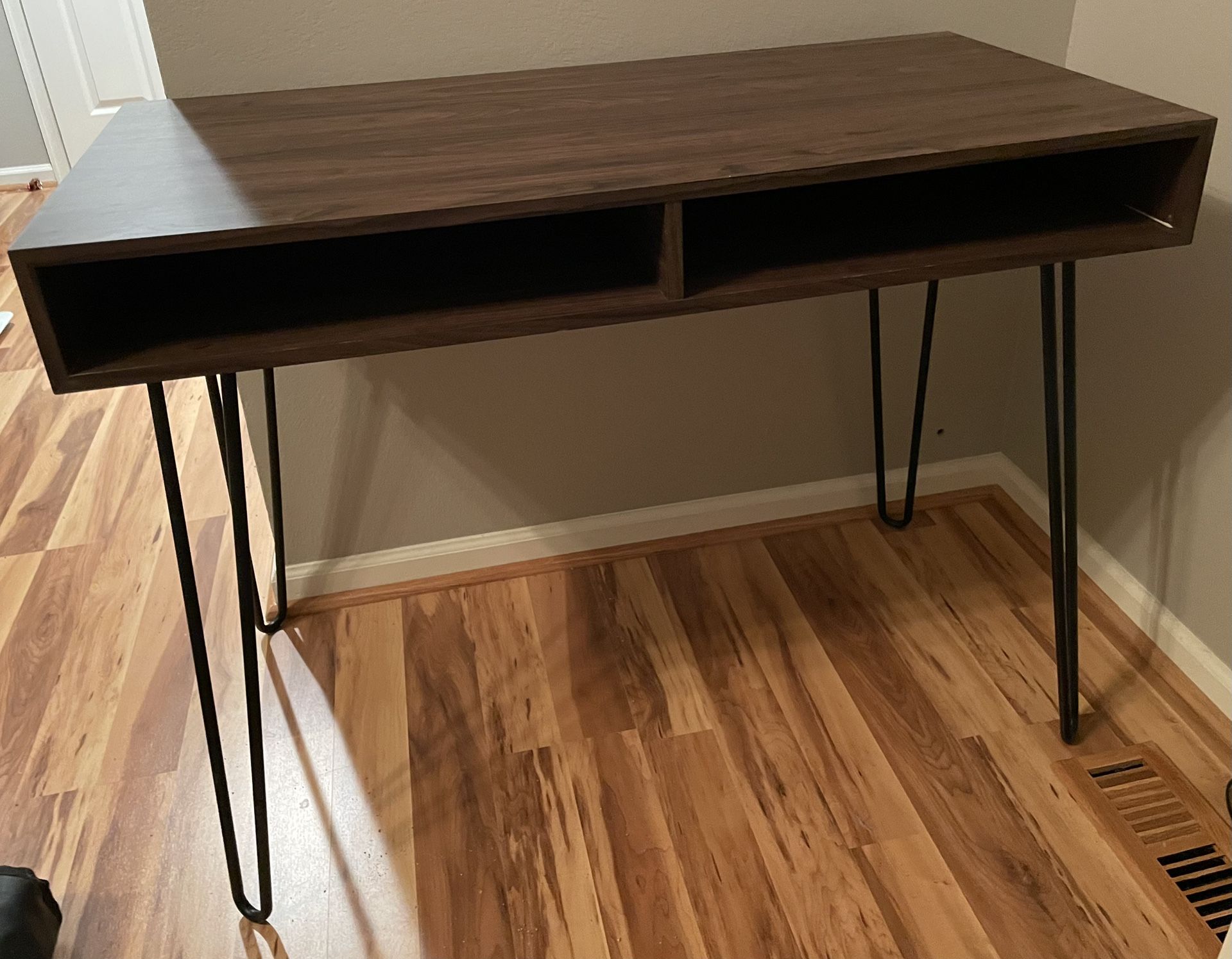 Wooden desk with metal legs