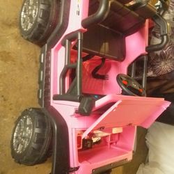 Kids Jeep. Color pink. Has a Remote and Charger. Also has new Battery just bought. Everything works as it should. See pics and videos. 
