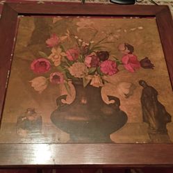 A charming 1940s vintage tilt-top table featuring a vibrant floral still life at its center.