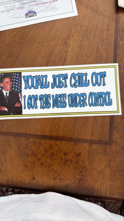 Barack Bumper sticker and newspapers