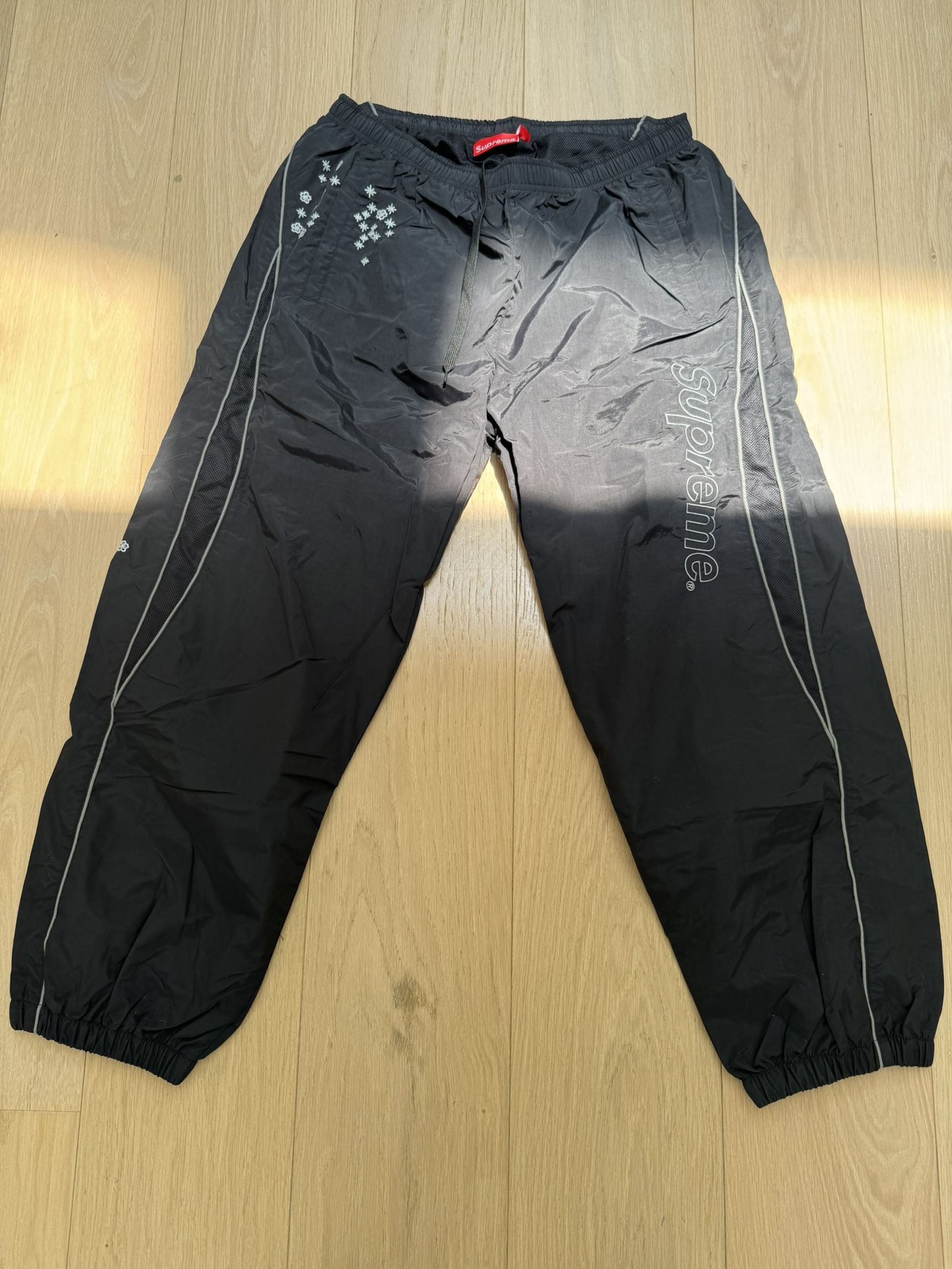 Supreme AOI Glow In The Dark Hooded Track Pants in Black