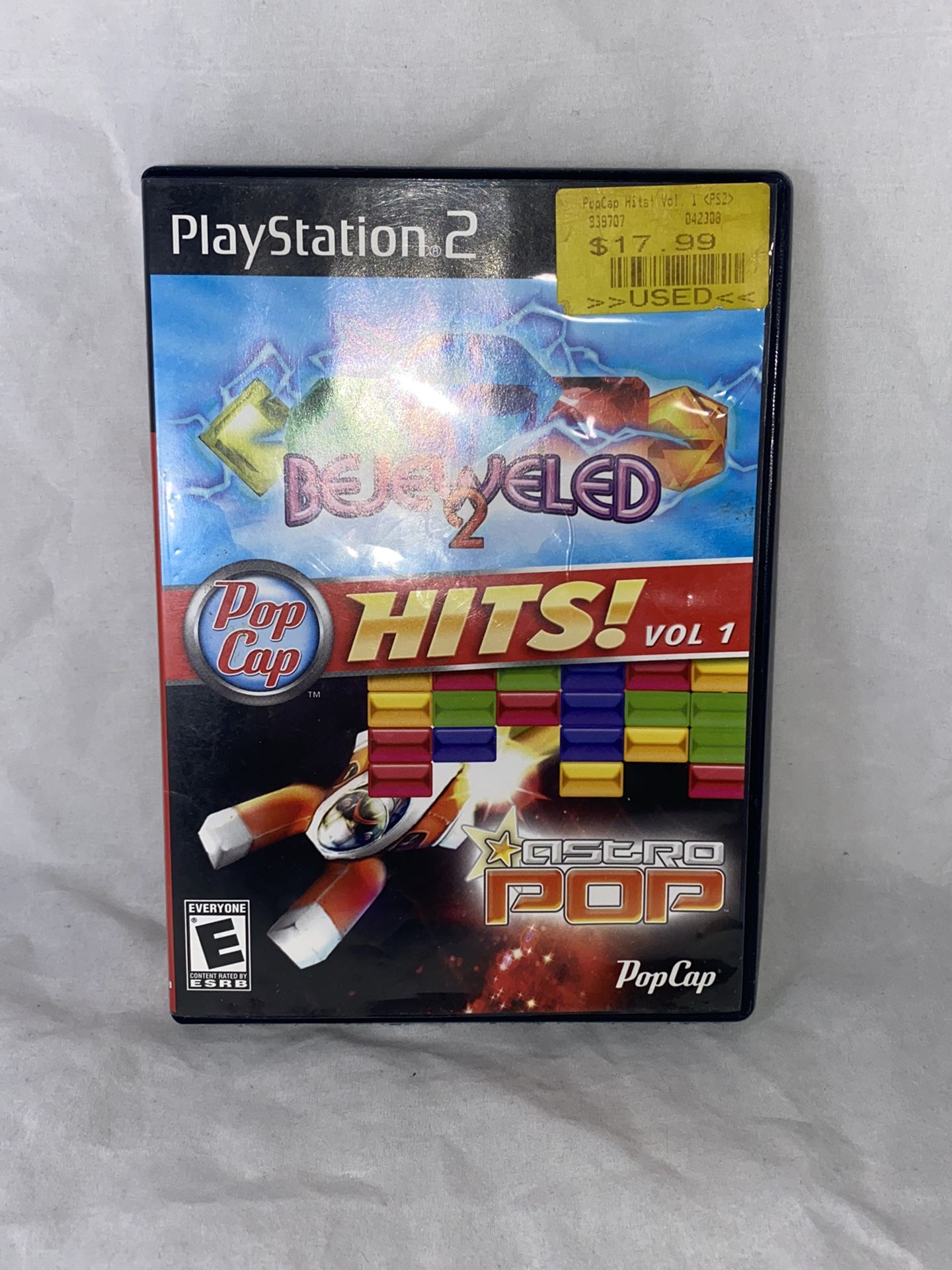 PopCap Hits Vol. 1 (Sony PlayStation 2, 2007).  The game comes with the instructions as well. Disc is in great shape without scratches. 