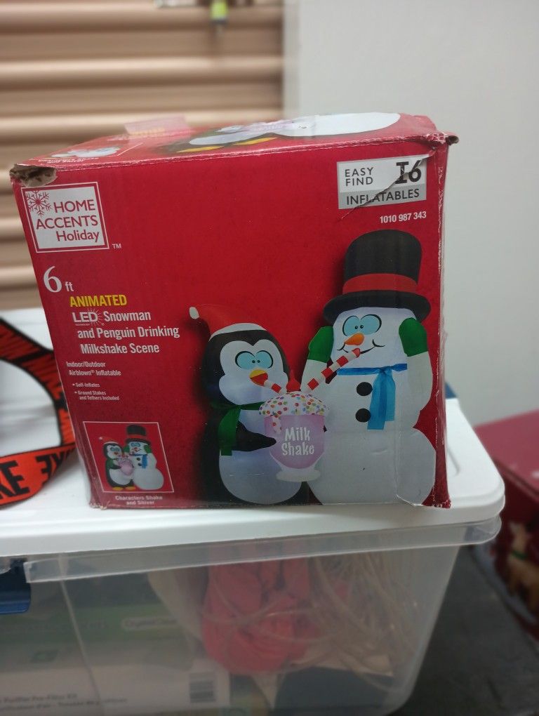 Snowman Penguin Drinking A Shake