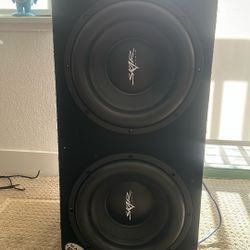 Two 12 Skar Audio 12’s With 2 Amps And A Battery Capacitor