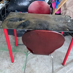 A Beautiful Glass Table (34” Long X 9” Wide) With Red  Legs, Matching  2 Red Chairs (NO SHIPPING)