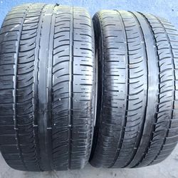 2 USED TIRES PIRELLI 285/35/22