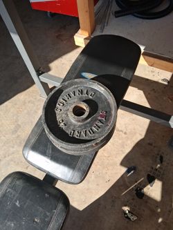 Bench bar 2   45s 2  25s an 4 10s plus 4 barbells