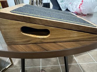 Wooden incline board or calf stretcher.