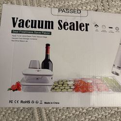 Vacuum sealer, unopened and sealed