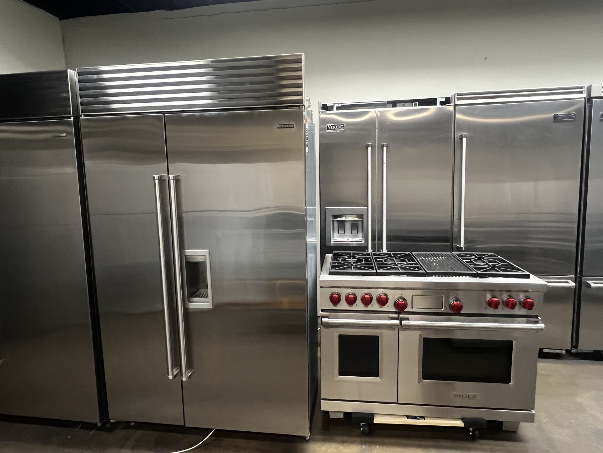 Wolf 48”Wide Dual Fuel Range And Sub Zero 48”Wide Built In Stainless Steel Refrigerator