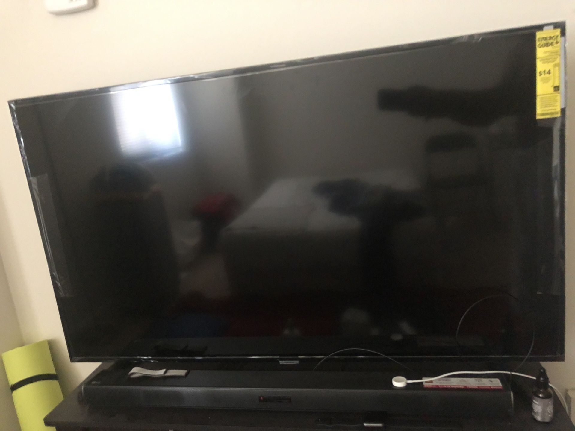 Samsung 50inch 6 Series | NU6900. LG 2.1ch sound bar and TV stand