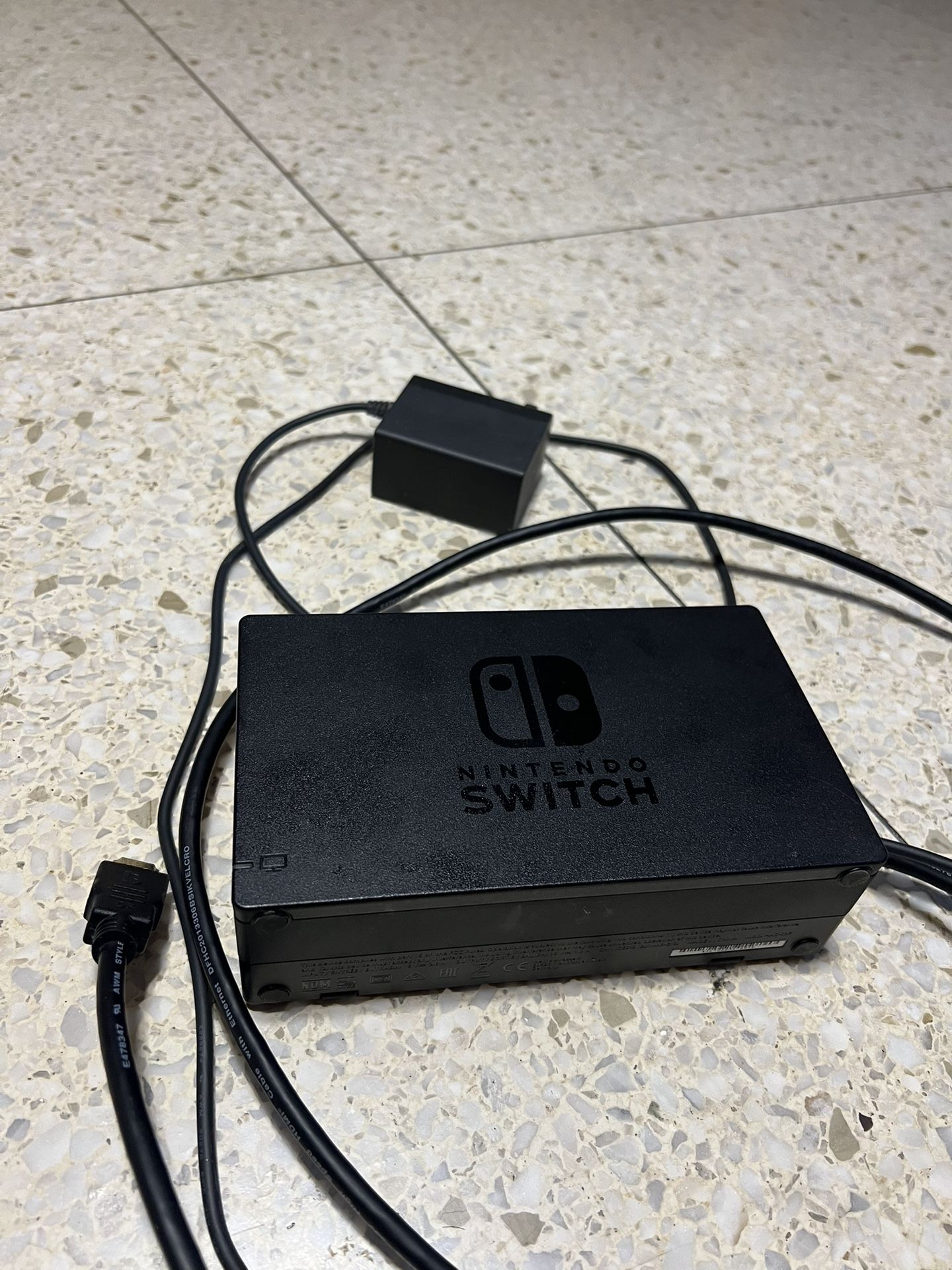 Nintendo switch dock with cables, power cable, and HDMI