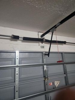 Overhead Garage Door Opener Spring Off Track Adjustment Replace And Parts