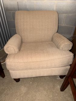 Oversized Beige Accent Chair with Decorative Pillows
