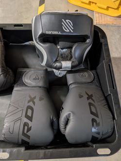 Boxing gloves and headgear