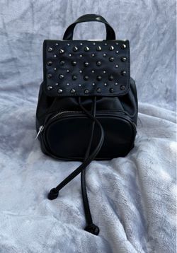 Small black studded backpack