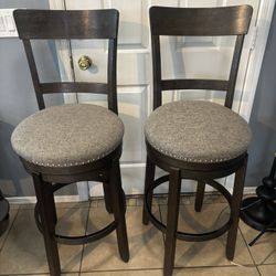 2 Beautiful Upholstered Swivel Stools