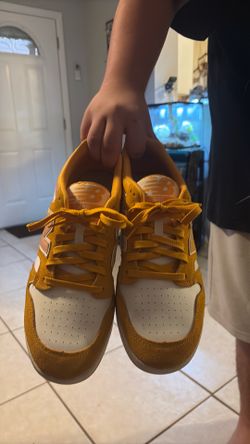 Yellow and white new balances