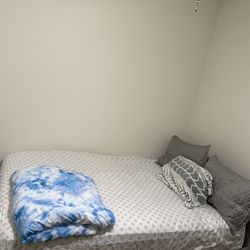 Queen-size IKEA bed frame with mattress – both in good condition. Ready for pickup!
