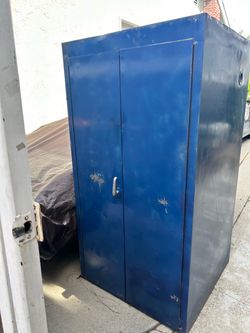 Large Blue metal cabinet double doors