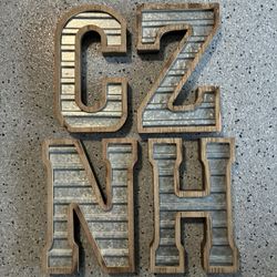 4 Wooden Tin Marquee Letters. Approx. 14” High x 9” x 1-3/4” Thick. Pre Owned.