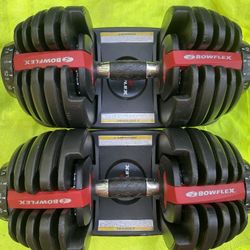 PAIR  OF  OLD  SCHOOL ADJUSTABLE  BOWFLEX  DUMBBELLS  :  EACH  ONES  GOES  UP TO  55 LBS.  =  110 LBS.  TOTAL 