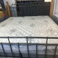 King size mattress and boxspring and bed. Good condition, free delivery.