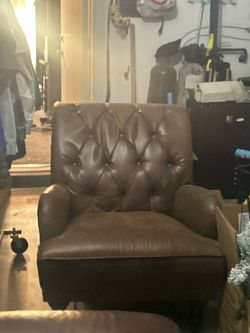 Decorative suede chair with classy looking material on back