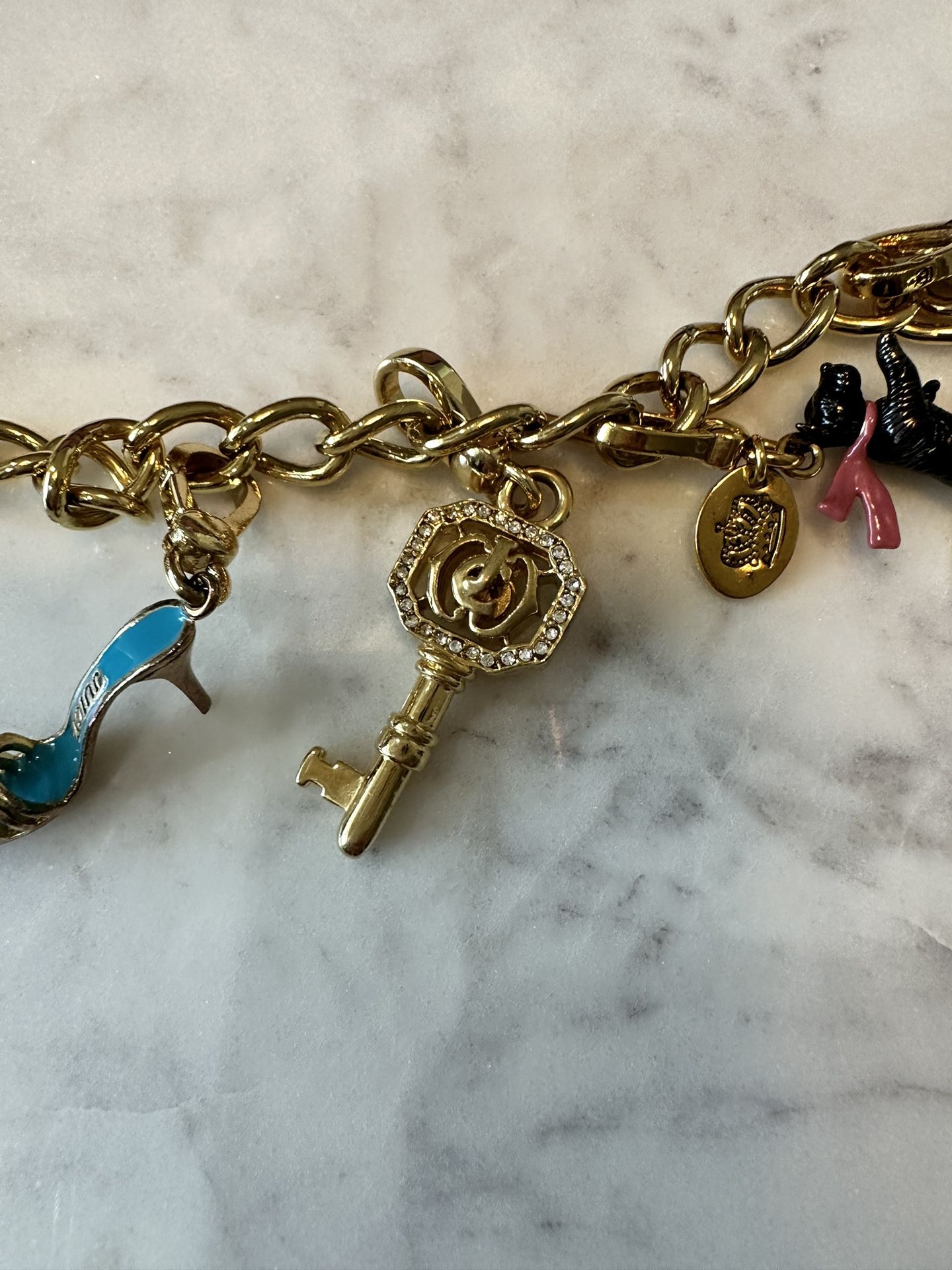 Juicy Couture Bracelet With Clock Charm for Sale in Queens, NY - OfferUp