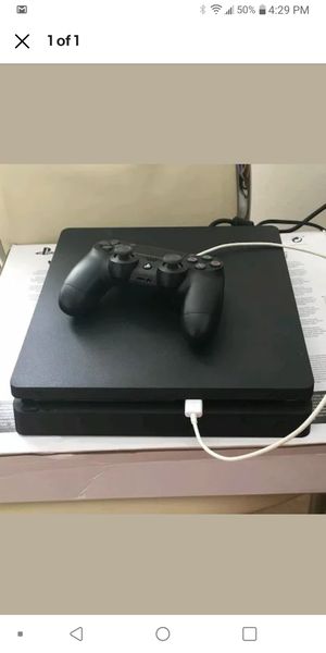 Photo Looking for used ps4 system with power cord and one controller