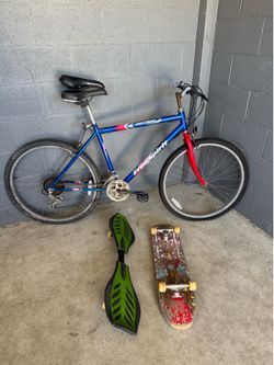 Free spirit mountain bike 26 tires, 2 skateboards and extra seat