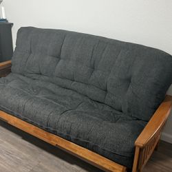 wooden sofa bed with full size mattress