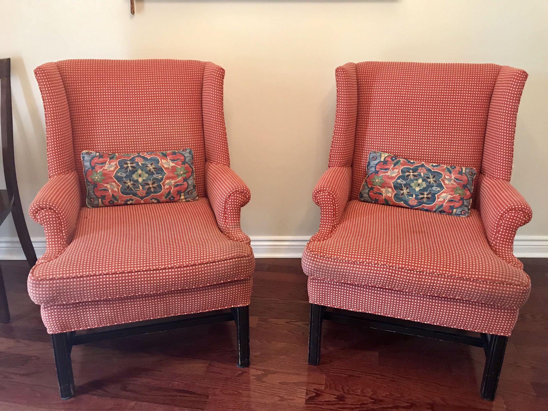 Red wingback chairs