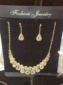 Gold and diamonds necklace and earrings