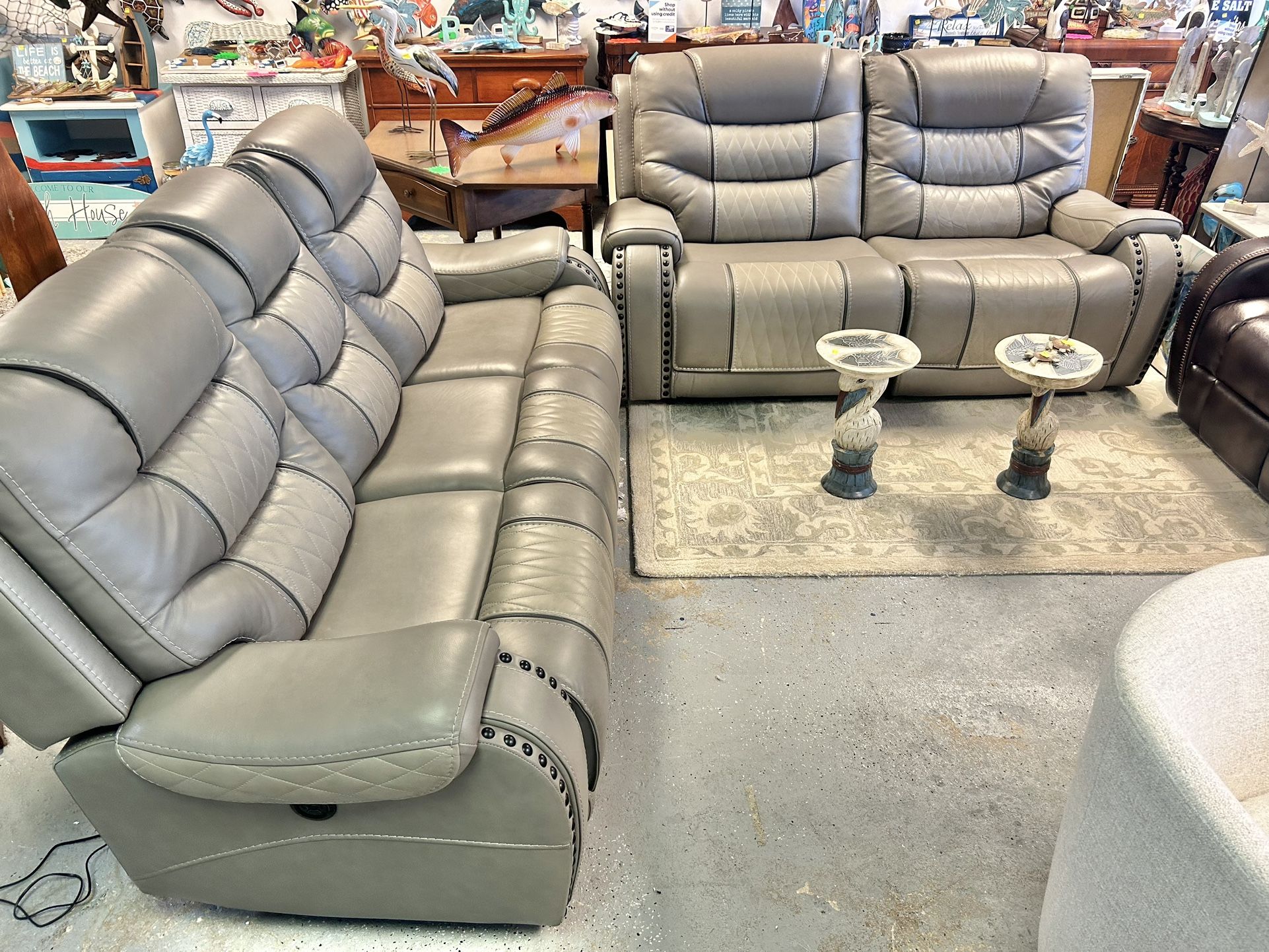 Like New Eric Church Leather Electric Dual Reclining Couch And Loveseat With Electric Headrests And Quad USB