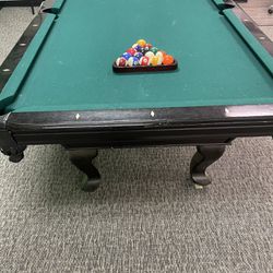 Pool Sticks and 7 foot table