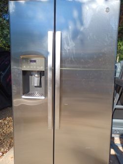 Nice brand new stainless side x side 10 months warranty