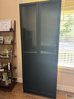 Must go- - For sale - $120 or OBO- 2 Tall Bookcases
