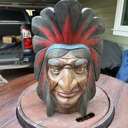 mahogany carved Indian head was bought in Lawton, OK in 1962 at a Choctaw Indian craft fair 22 inches tall by 17 wide