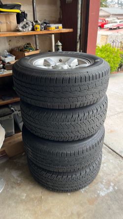 4 tires with Toyota rims 16 inches
