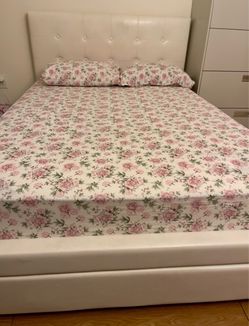 Full-size off white faux leather bed frame