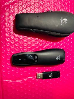 Logitech R400 wireless presenter remote laser. With usb receiver