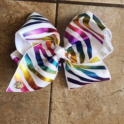 New. New without tags. JoJo Siwa Rainbow Zebra Bow