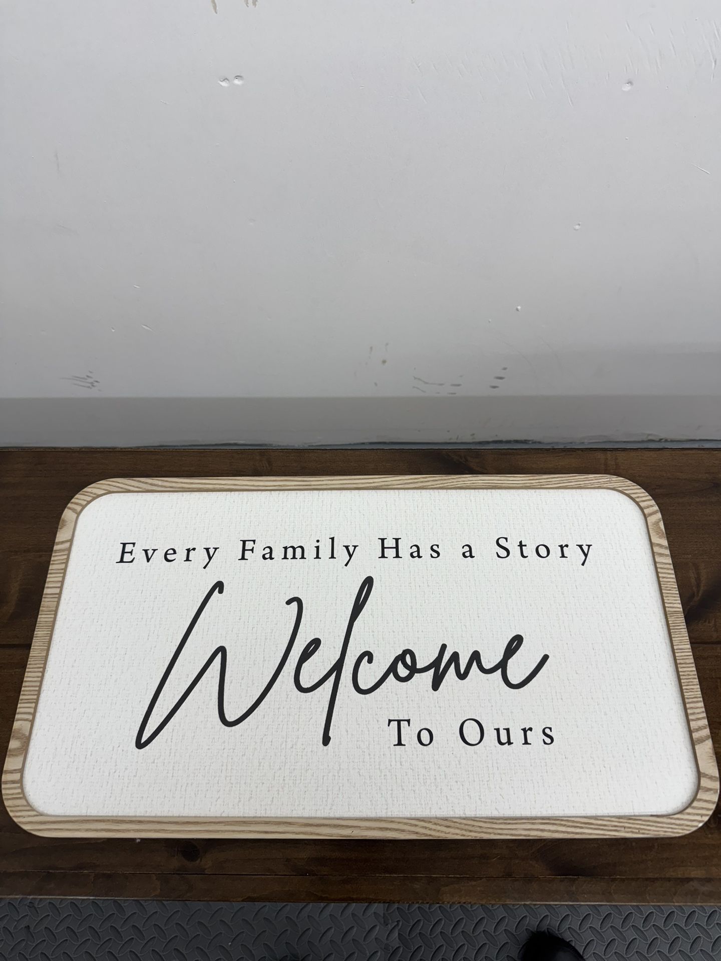 Disney Winnie the Pooh wall art featuring a clean sketch-style design of Pooh and Piglet in a field of flowers. Framed in a wood-tone finish. • Offic