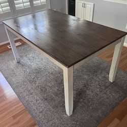 36x60 inch kitchen table, and 6 chairs