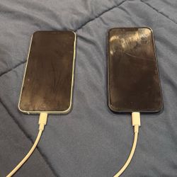 White iPhone 12 And Black iPhone 14