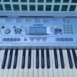 Yamaha Portatone Electric Keyboard With Stand