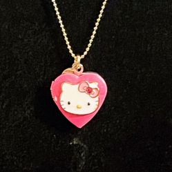 Hello Kitty locket necklaces 15” inches long 