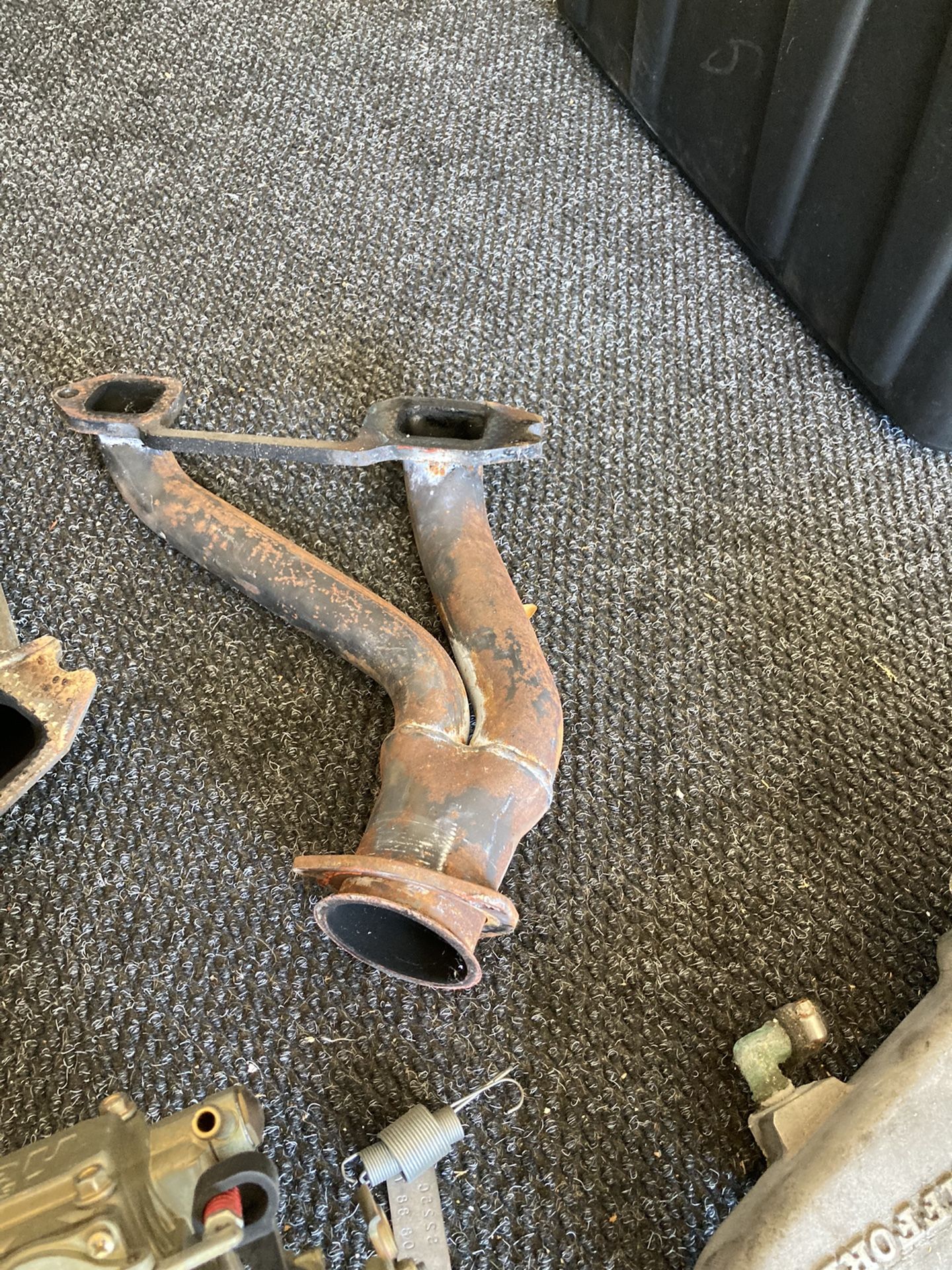 Chevy 235 clifford intake manifold with a holly carburetor number 8007